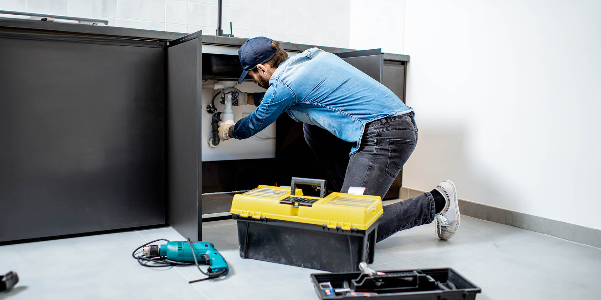 Plumbing professional inspecting pipes